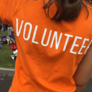 Woman wearing volunteer tshirt