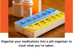 Pill holder with prescription bottle in the background