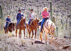 people on horses
